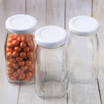 Perfectly plain collection medium size glass vintage milk bottle