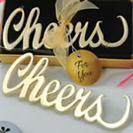 Metal cheers bottle opener with a gold finish