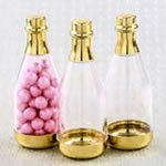 Perfectly plain gold accented clear champagne bottle container