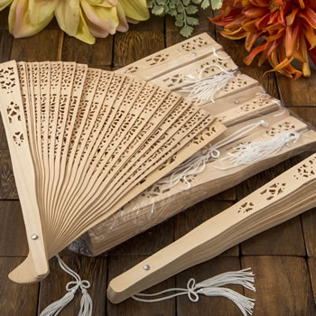 Intricately carved Sandalwood fan favors from Fashioncraft&reg;