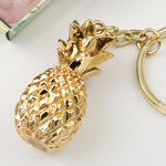 Warm Welcome Collection gold pineapple themed key chain